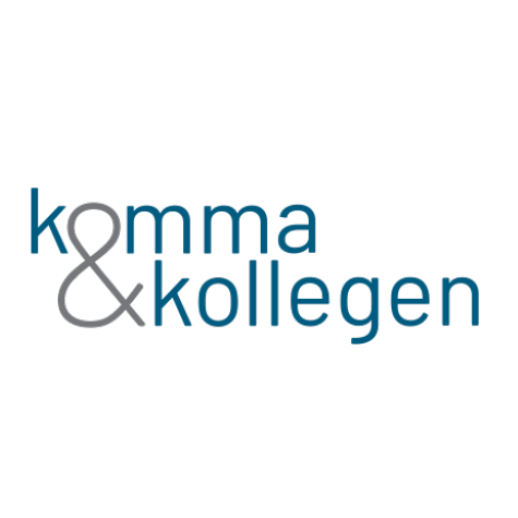 komma-457x475-1