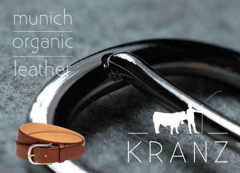 Fotoausschnitt der Gürtelschnalle und rechts unten das weiße Logo von Kranz by Immagine Werbeagentur München